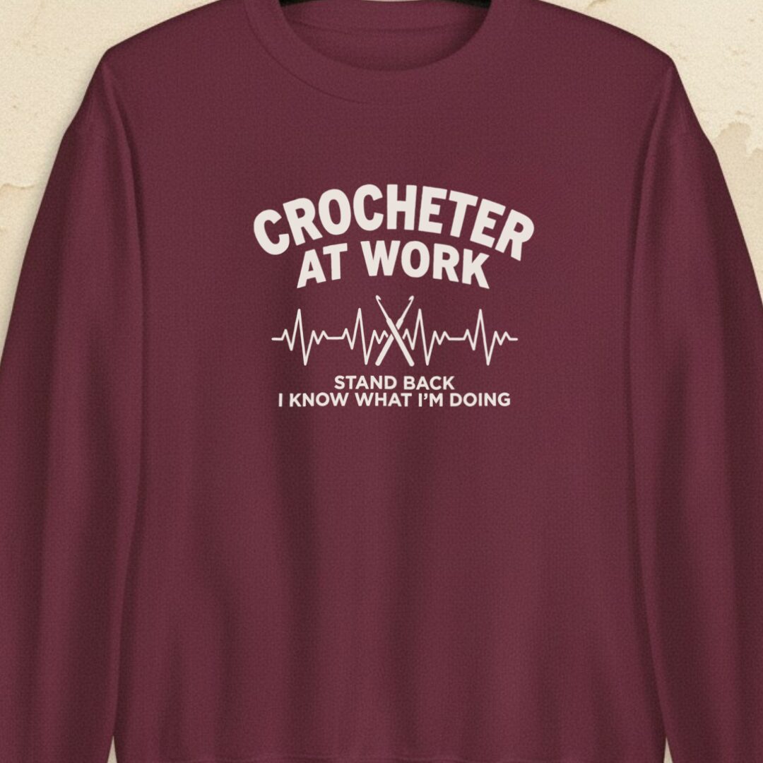 Crocheter At Work Maroon Sweatshirt.jpg