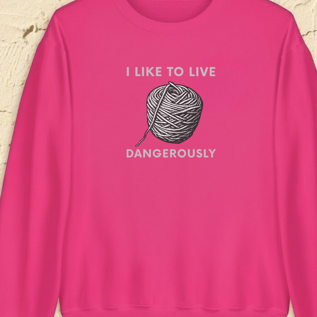 Live Dangerously Bright Pink Sweatshirt.jpg
