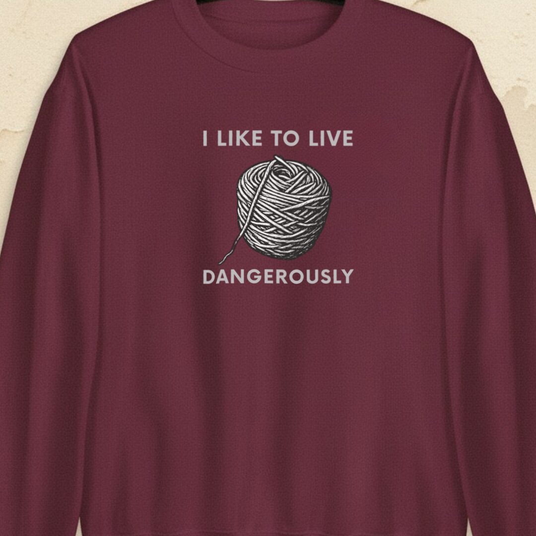 Live Dangerously Maroon Sweatshirt.jpg