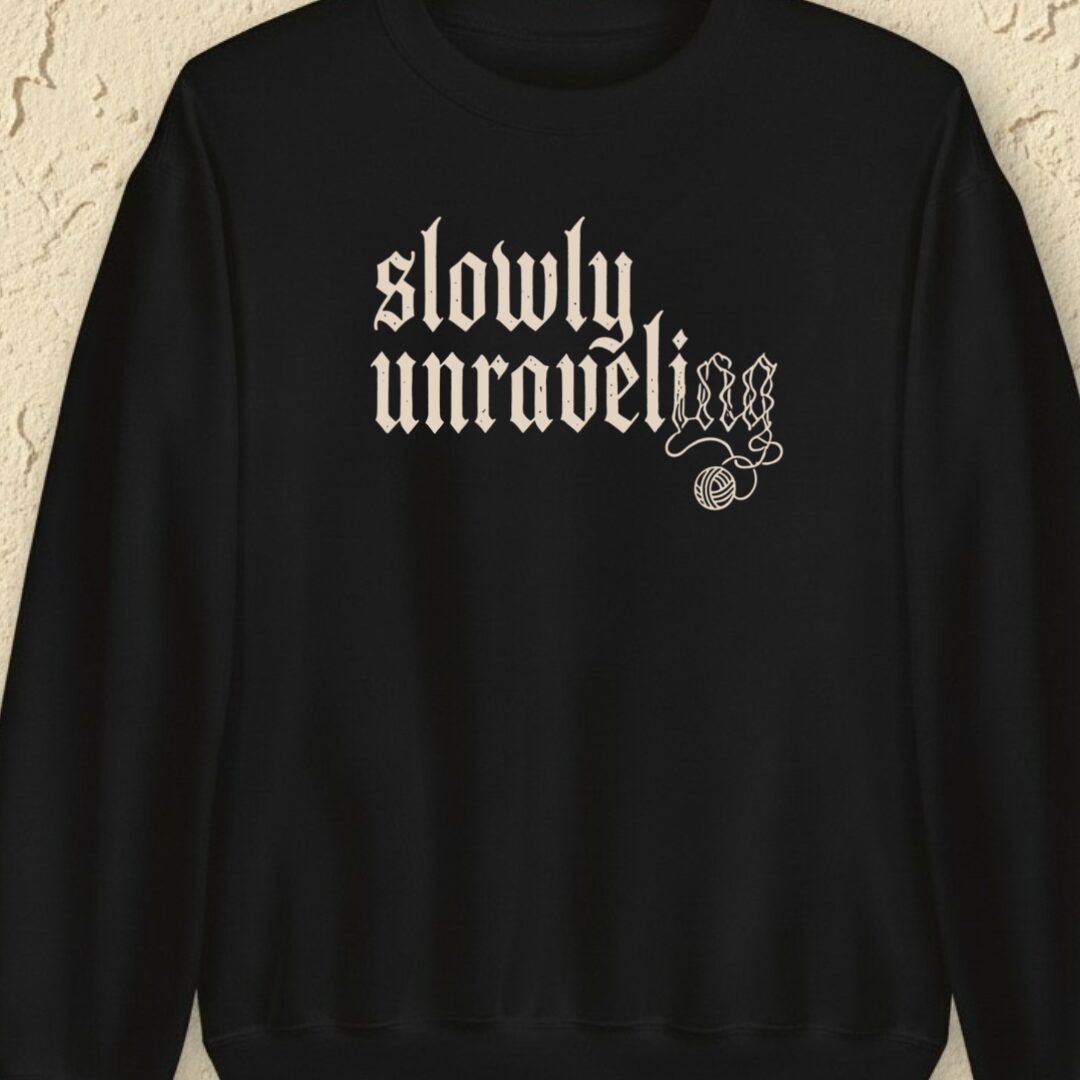 Unraveling Black Sweatshirt.jpg