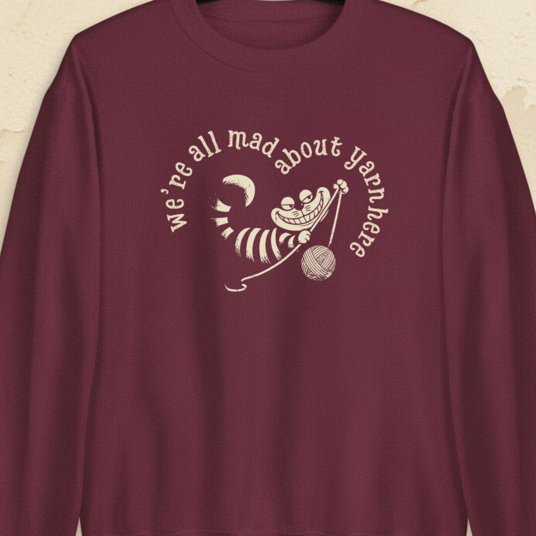 We're All Mad Here Maroon Sweatshirt.jpg