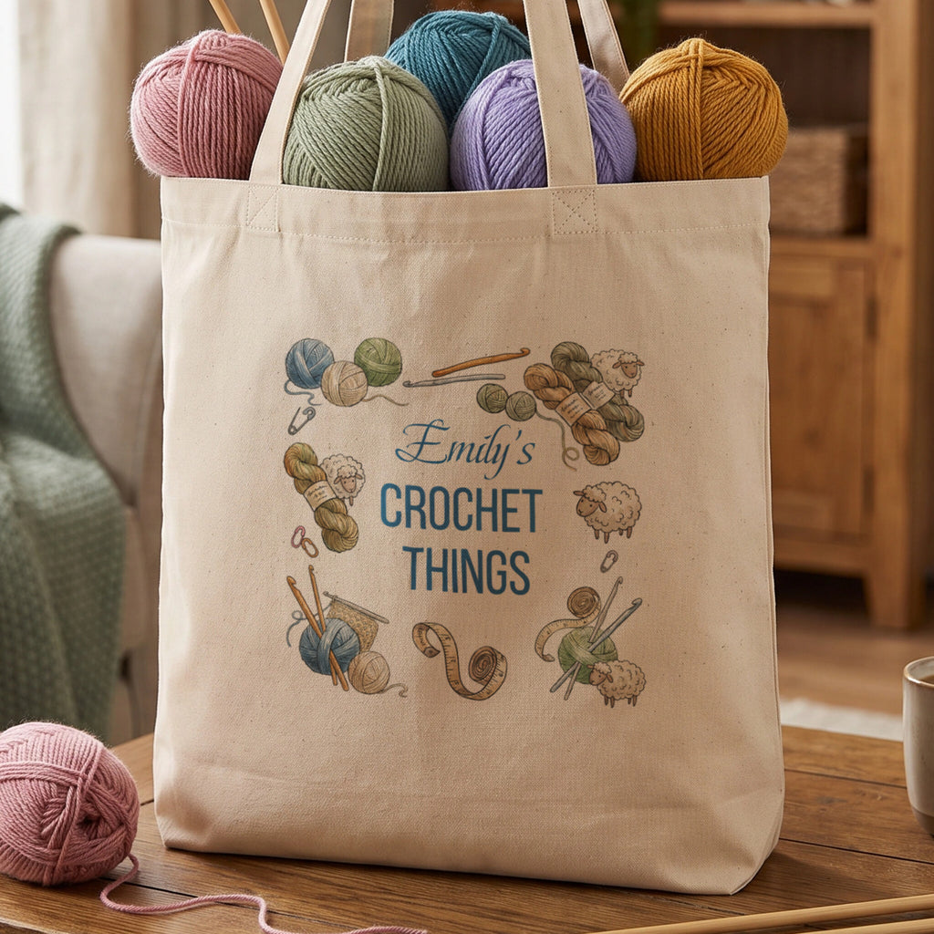 Natural tote bag reading Emily's Crochet Things, framed by illustrated yarn, hooks and sheep