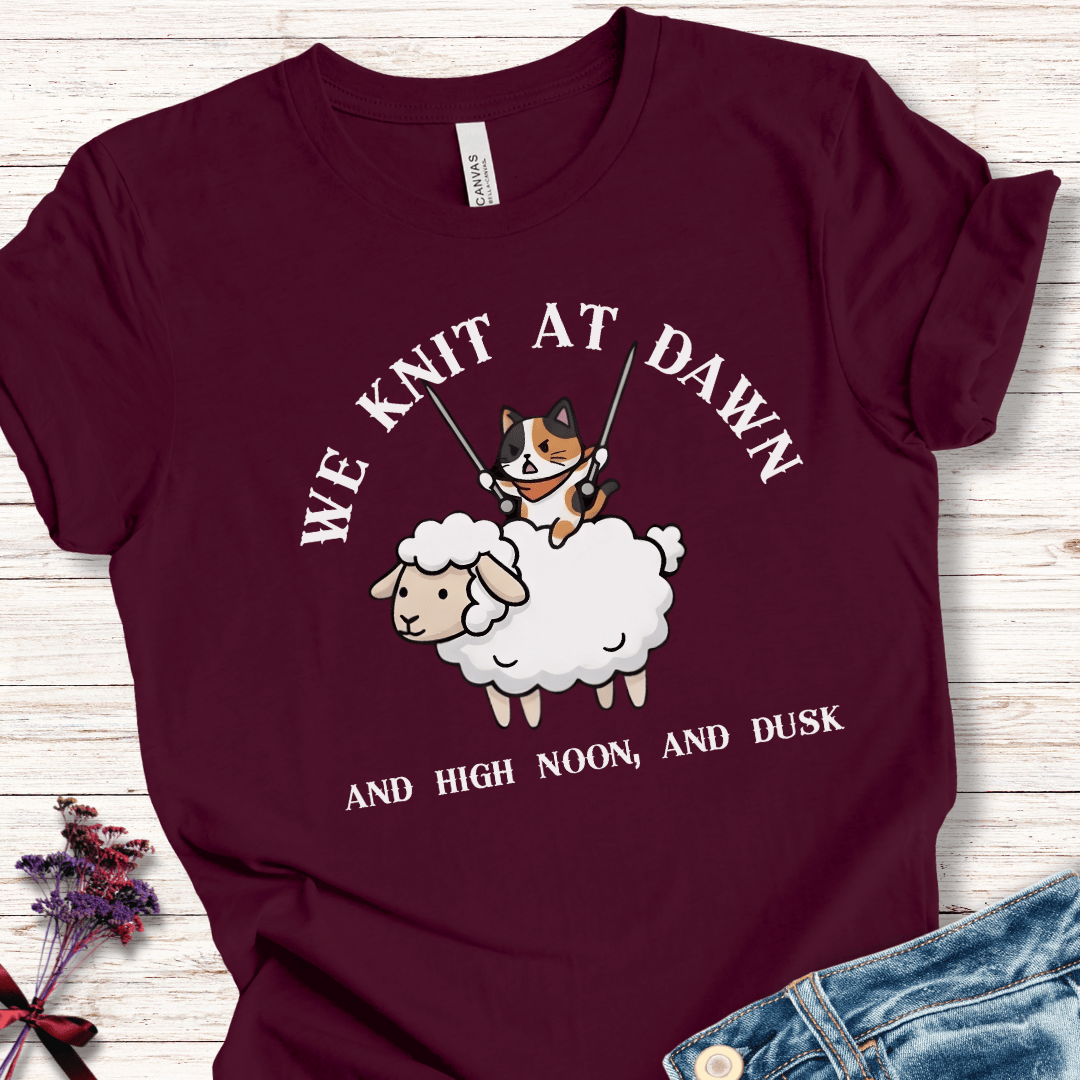 Maroon cotton t-shirt featuring a cute cat and sheep graphic with knitting theme.