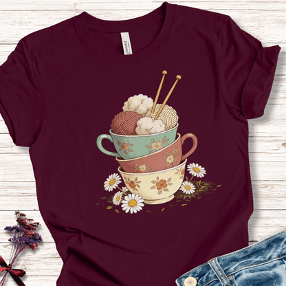 Maroon t-shirt featuring vintage ice cream cups design and floral accents, perfect for casual wear.