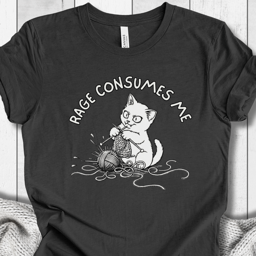 Funny black t-shirt featuring a cat knitting with the phrase 'Rage Consumes Me' printed in white.
