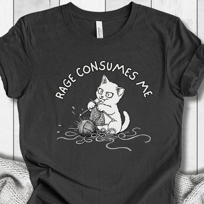 Funny black t-shirt featuring a cat knitting with the phrase 'Rage Consumes Me' printed in white.
