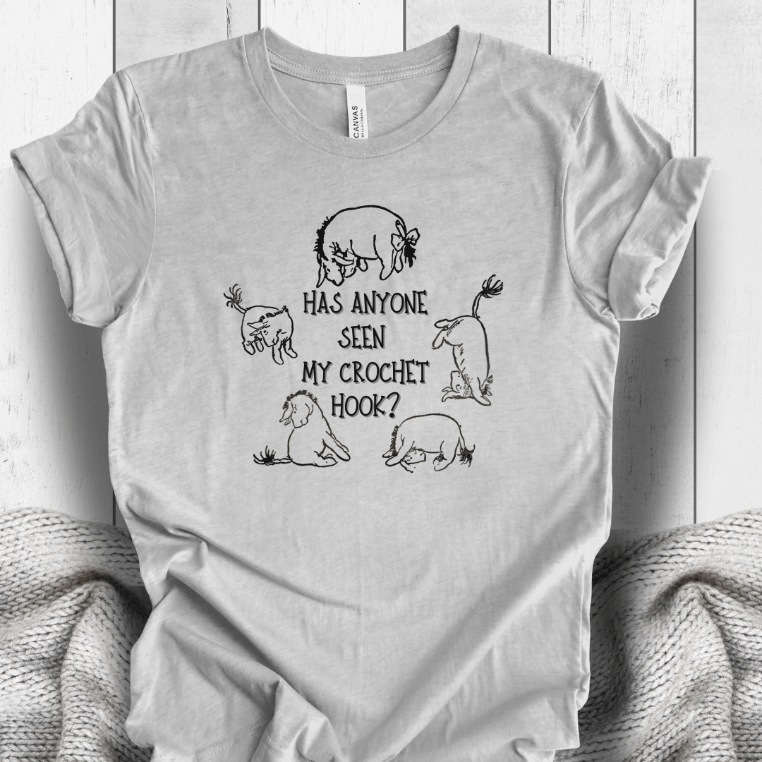 Light gray t-shirt with playful dog graphic, featuring the text 'Has anyone seen my crochet hook?'