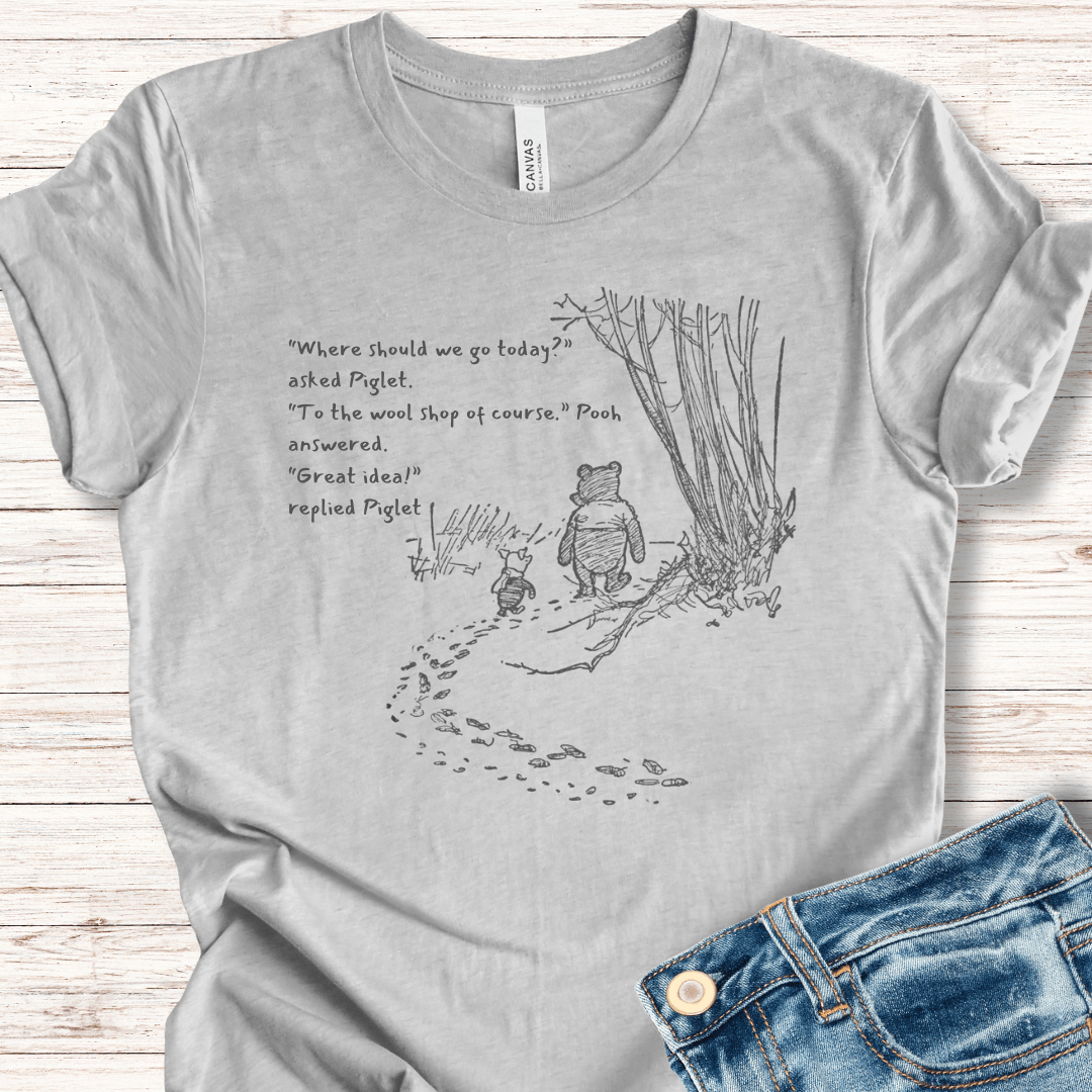 Gray cotton t-shirt featuring Pooh and Piglet walking with a whimsical quote about visiting a wool shop.