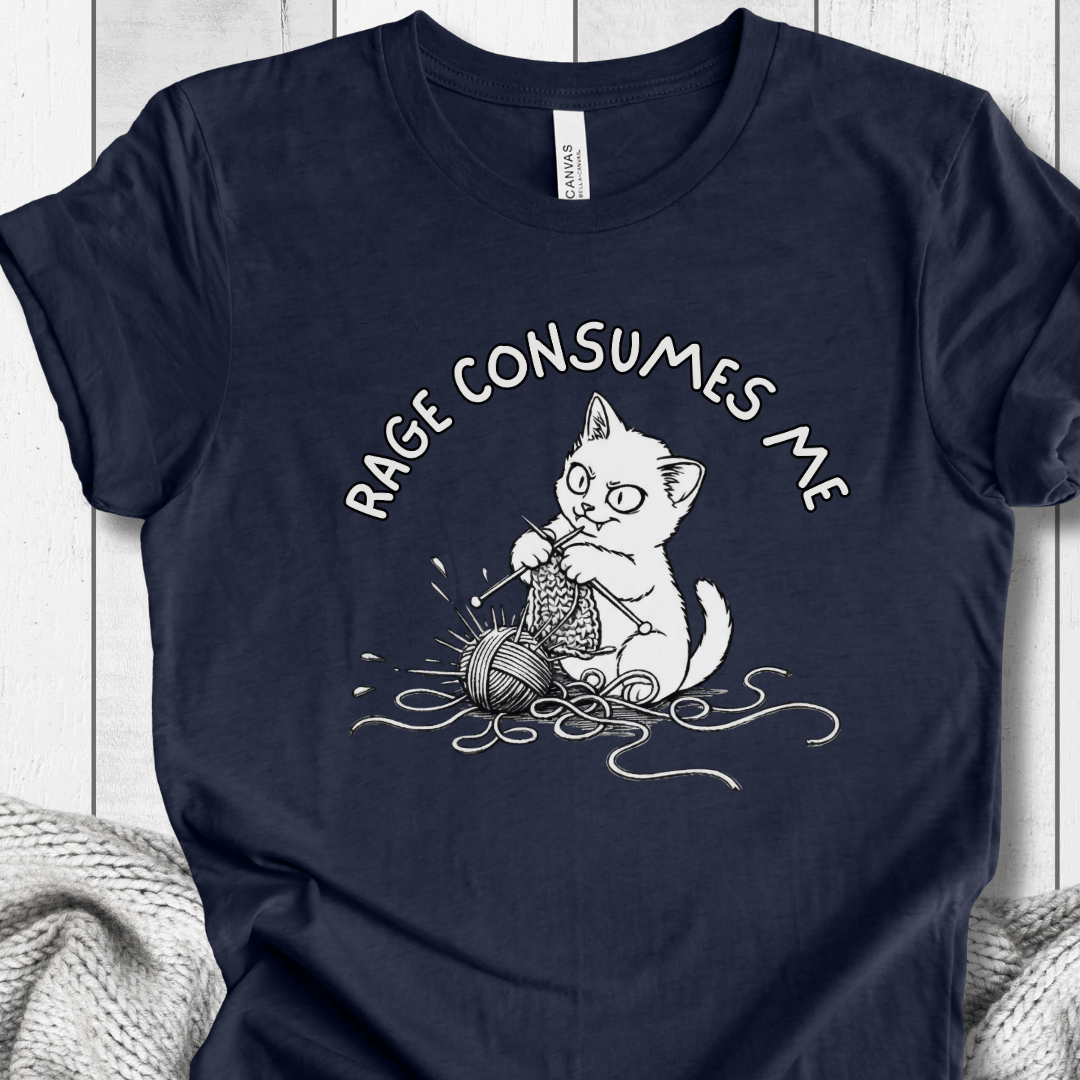 Navy blue t-shirt featuring a cute cat knitting with the text 'RAGE CONSUMES ME', perfect for cat lovers.