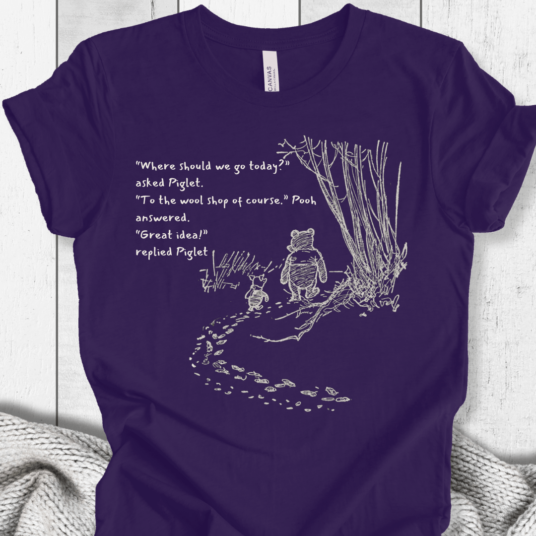 Navy blue t-shirt featuring Pooh and Piglet illustration with quote, soft cotton material.
