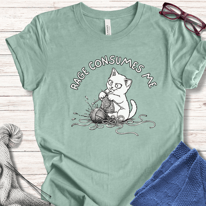 Light green cotton t-shirt with a cat graphic and 'RAGE CONSUMES ME' text, ideal for cat lovers.